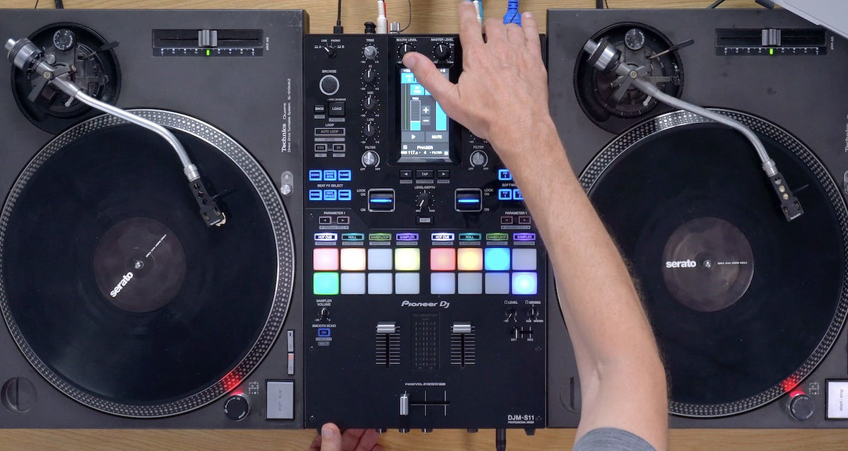 Top view of Pioneer DJM-S11 mixer setup with Technics turntables used for DJ mixing and scratching at Denver DJ School